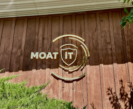 MOATiT logo displayed on a building exterior, representing Idaho clinics exploring the benefits of AI vs. traditional IT solutions for smarter, more secure healthcare technology.