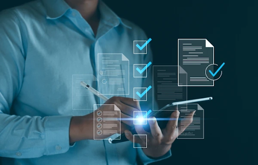 Business professional using a tablet with digital checklists and documents, representing cybersecurity compliance and data protection management.
