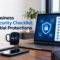 Business owner and IT specialist reviewing a small-business cybersecurity checklist